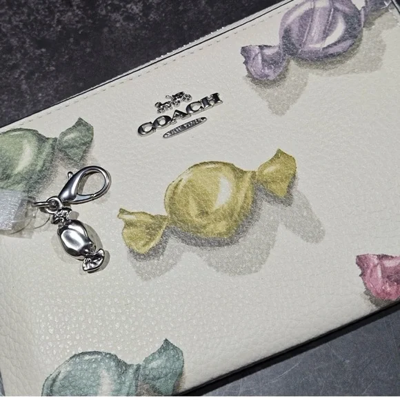 Coach Corner Zip Wristlet in
Candy Print with Charm Refined
Pebble Leather NWT - Picture 3 of 7